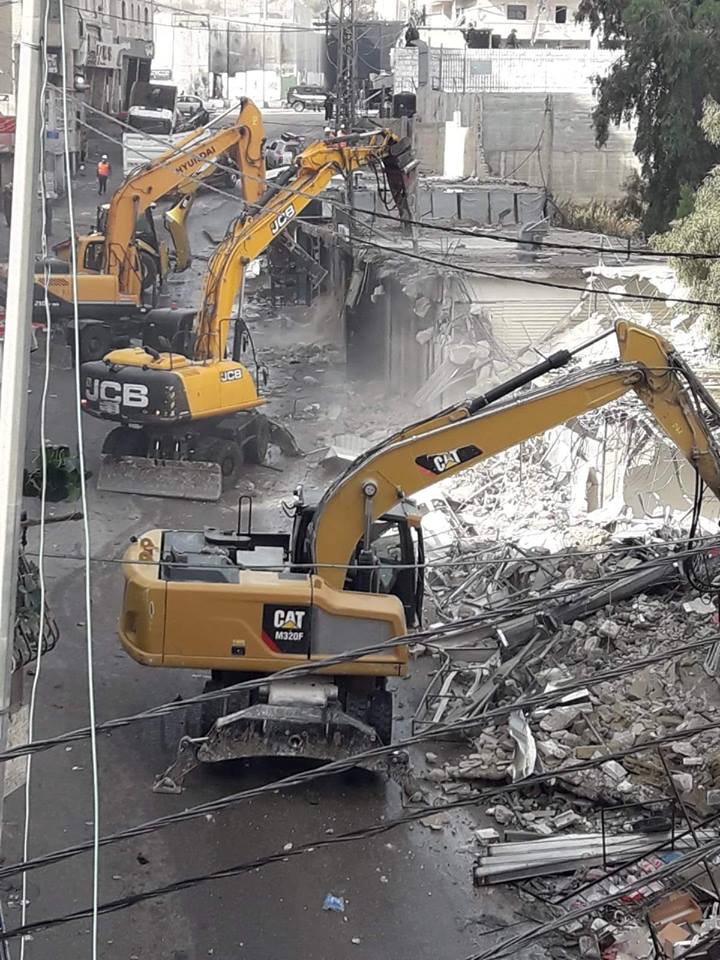 الاحتلال يهدم محلات تجارية بالجملة في القدس